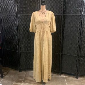 Wild fable size large. Tan dress with yellow flowers.